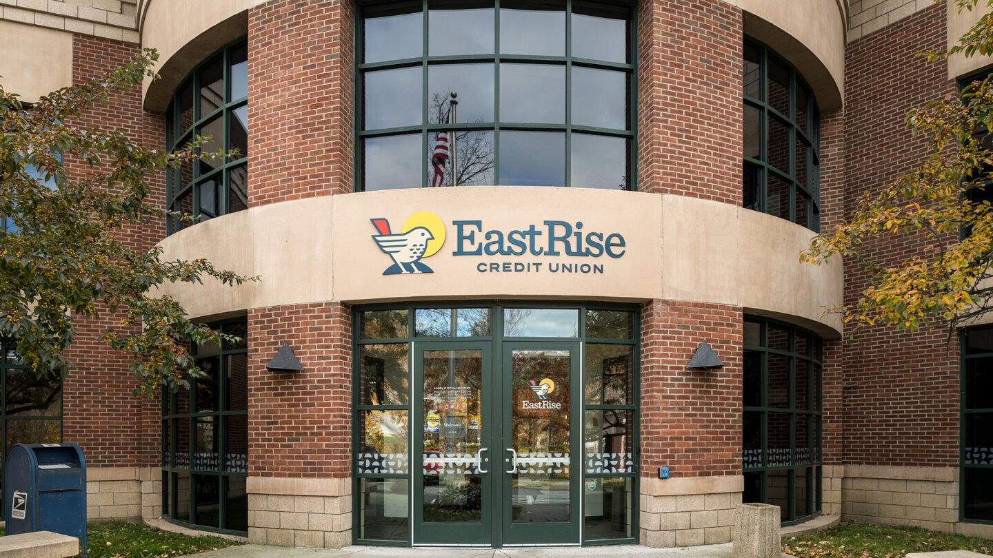 Outside of EastRise Credit Union branch showing exterior signage and door design