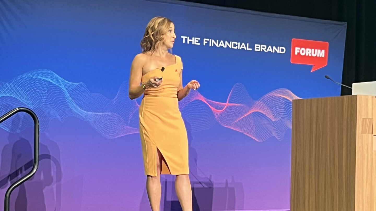 Gina Bleedorn on stage speaking at The Financial Brand Forum
